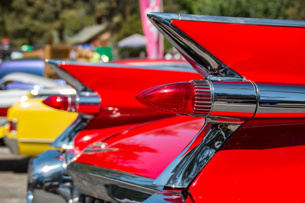 The classic styling of a 1959 Cadillac, with tail fins and bullet taillights.