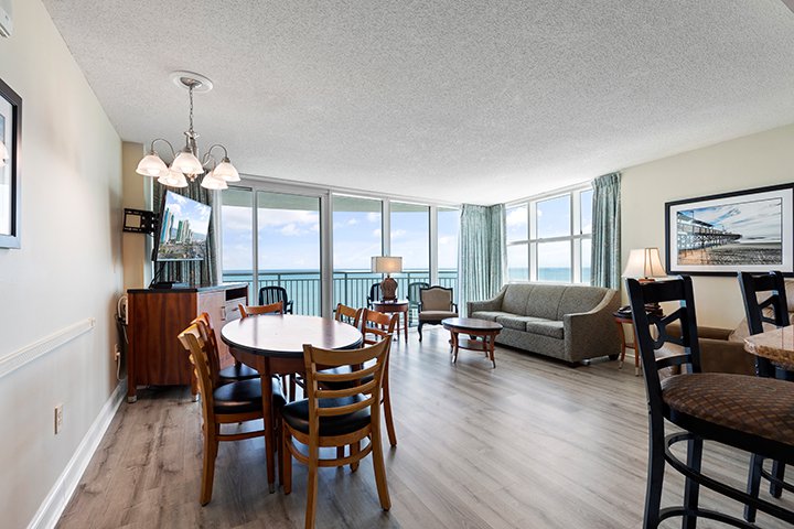 Living Space with view of ocean in a two-bedroom Deluxe Condo at Sandy Beach Oceanfront Resort